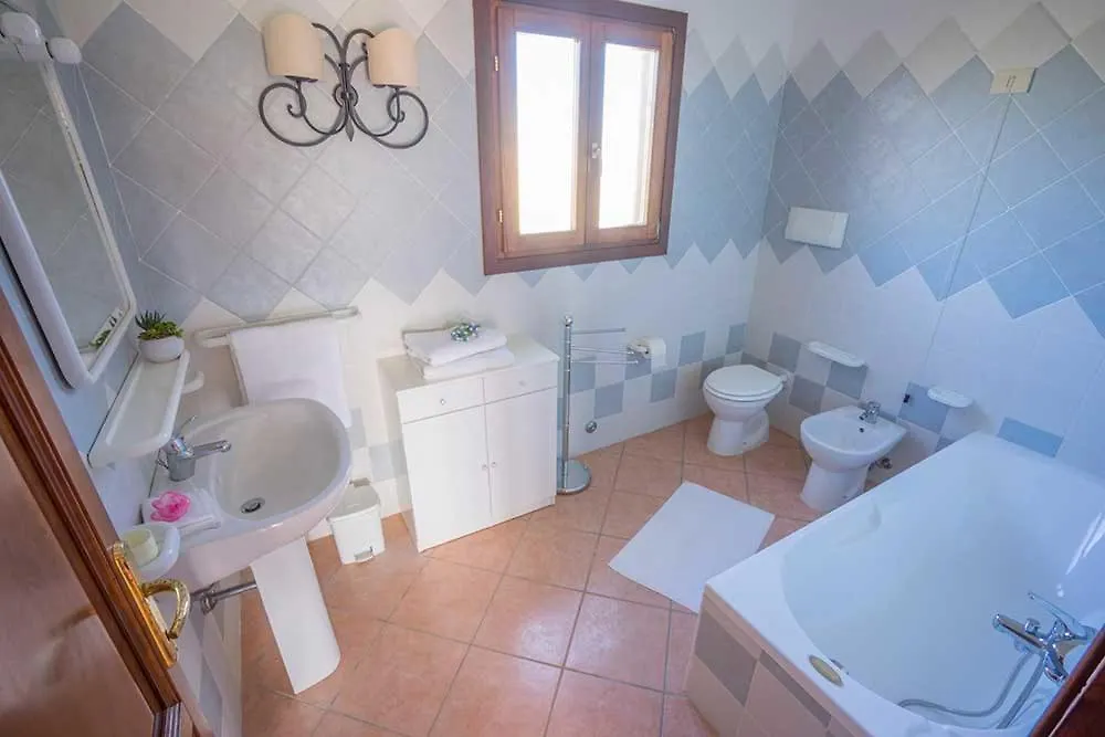 residence baia sant anna con piscina Tanaunella